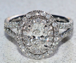 Certified 2.80Ct Oval Cut Diamond Halo Engagement Ring in Solid 14K White Gold, an item from the 'The Sweetest Ring' hand-picked list