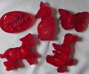 Vintage Red Plastic Cookie Cutters for Spring, Egg, Rabbit, Lamb, Duck Butterfly, an item from the 'Bunny Babies' hand-picked list