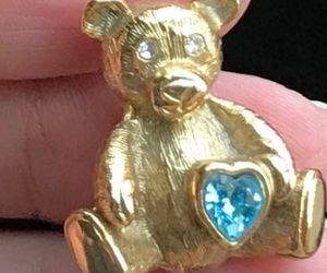 TEDDY BEAR holding Blue Stone HEART Gold-Tone Brooch Pin - signed 1928, an item from the 'Have a heart' hand-picked list